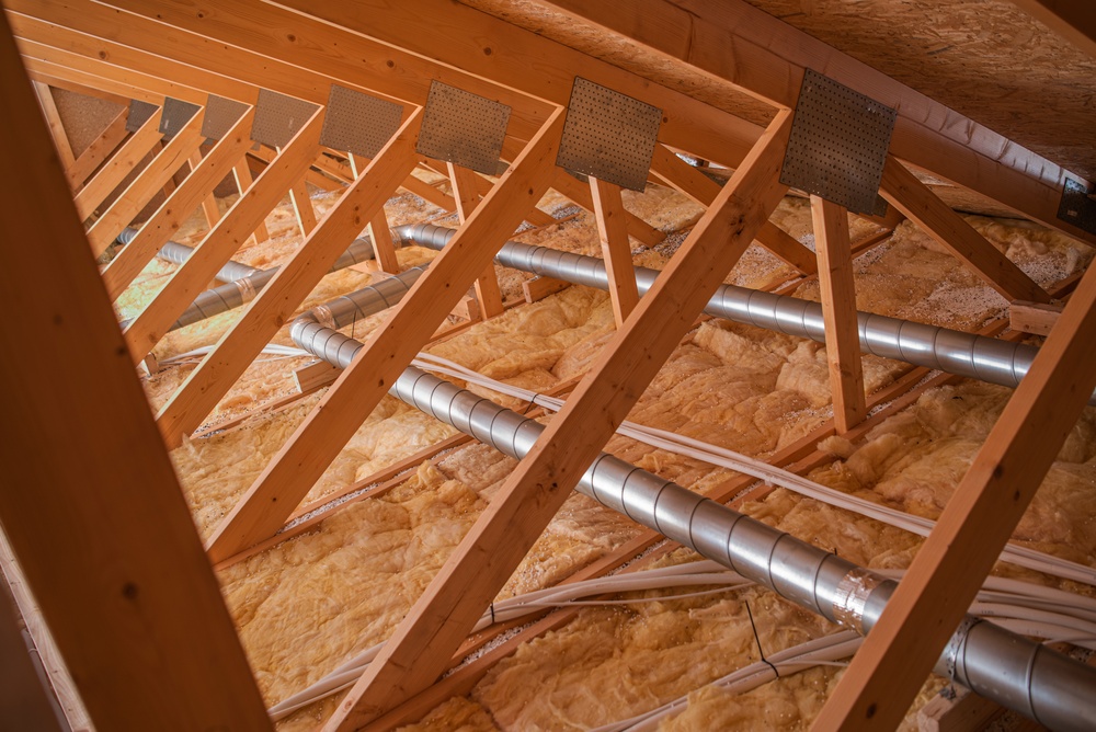 Construction,Work,Shows,Wooden,Beams,And,Insulation,In,An,Attic